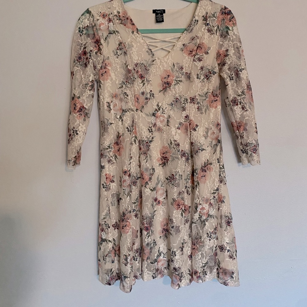 Rue21. Size medium. Cream color with floral print